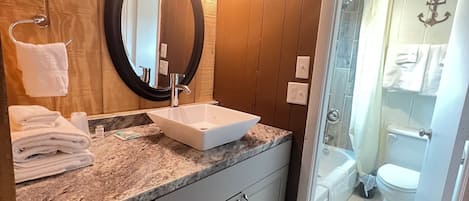 Economy Double or Twin Room | Bathroom | Combined shower/tub, rainfall showerhead, towels, soap