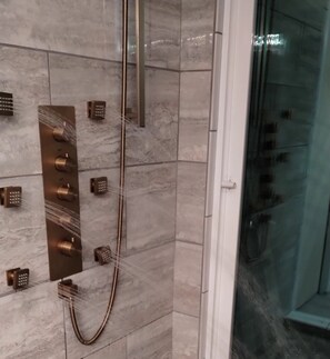 Shower, hair dryer, towels, soap