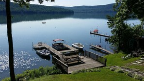 Water-side deck for dining, and dock beyond