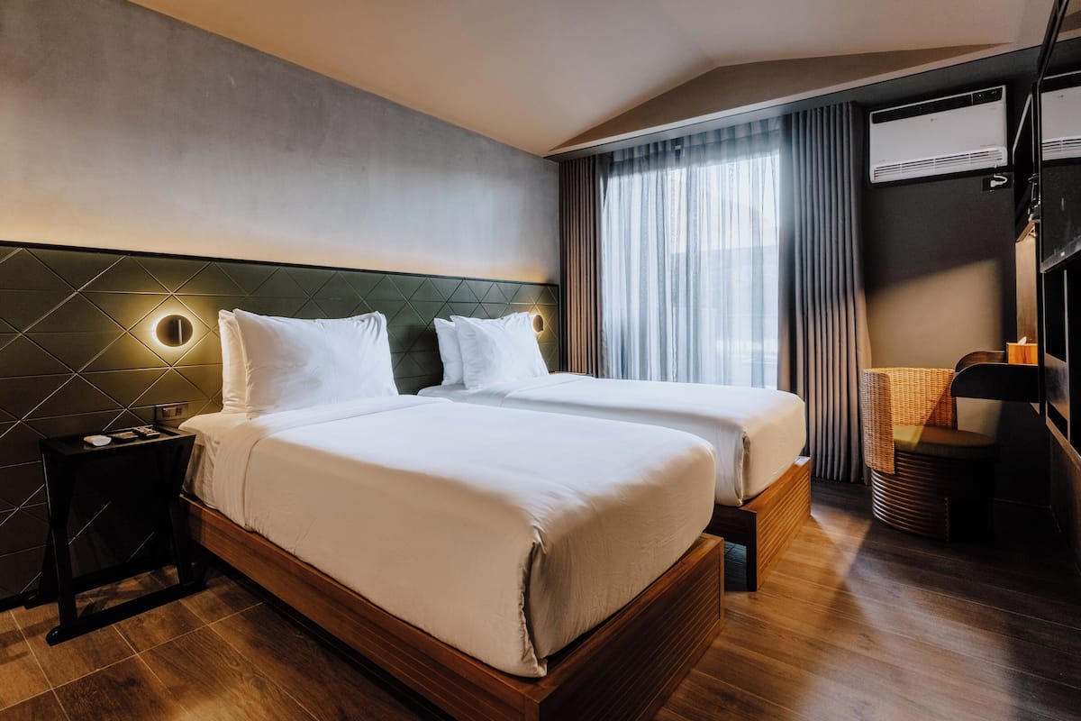 Deluxe kamer, 1 twee- of 2 eenpersoonsbedden | Een kluis op de kamer, verduisterende gordijnen