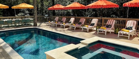 A heated pool, pool loungers