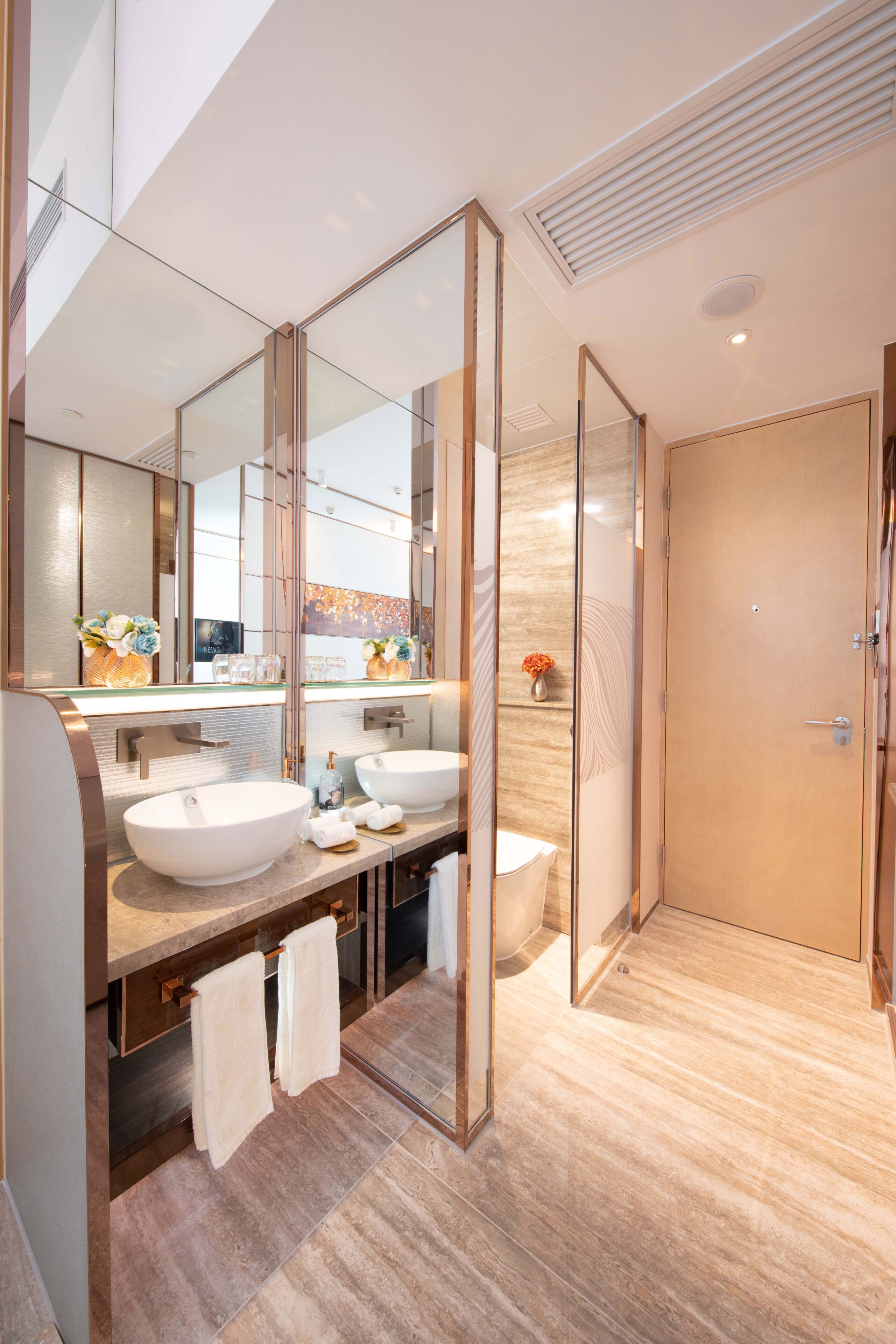 shower, hair dryer, slippers, towels