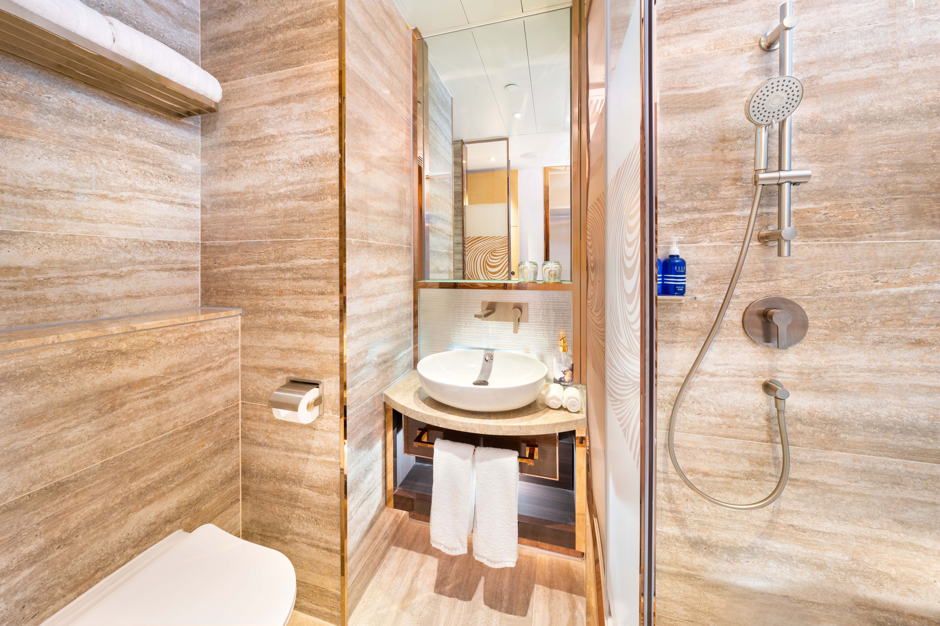 shower, hair dryer, slippers, towels