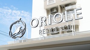 A building with a sign that reads "ORIOLE RESIDENCE". - Oriole Residence (Bang Phli)