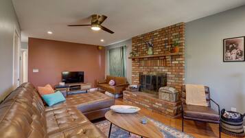 Smart TV, fireplace, DVD player, books