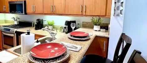 Coffee/tea maker, fridge, microwave, oven