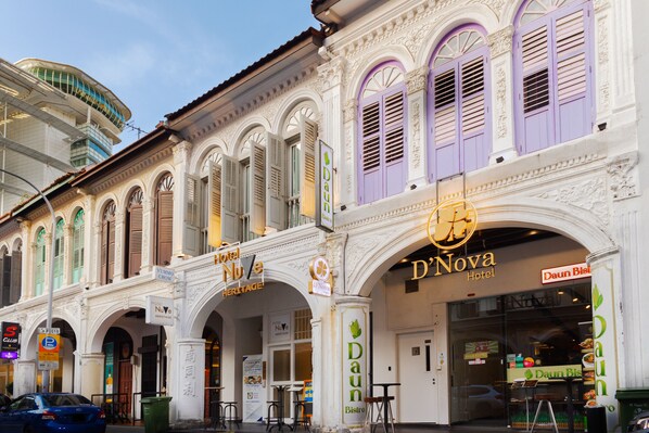 A historic building with a 'D'Nova Hotel' sign, ornate architecture, and a 'Daun Bistro' sign. - D'nova Hotel @ Bugis (Singapore)