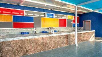Enjoy the stylish public area with a marble counter and vibrant wall panels.