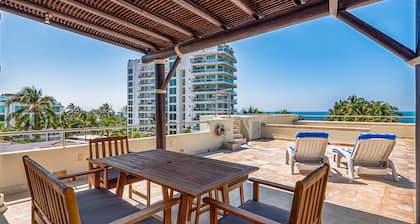 Ocean-view condo with private rooftop pool, terrace, & resort-style pool