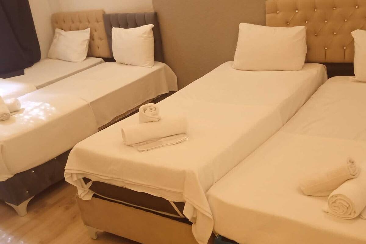 Luxury Quadruple Room | Premium bedding, minibar, desk, soundproofing