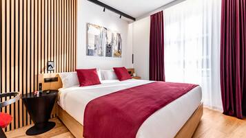 Ropa de cama de alta calidad y minibar