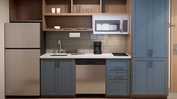 Full-sized fridge, microwave, stovetop, dishwasher