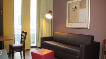 Comfort Double Room, Refrigerator, Ground Floor | Living area | 35-inch flat-screen TV with satellite channels, TV