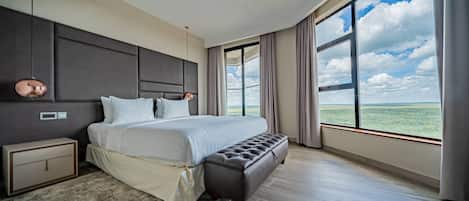 Apartment, 1 Bedroom | 1 bedroom, in-room safe, blackout drapes, iron/ironing board