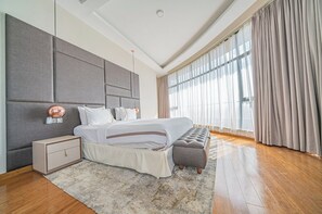 Suite Premium | Caja fuerte, cortinas opacas, tabla de planchar con plancha