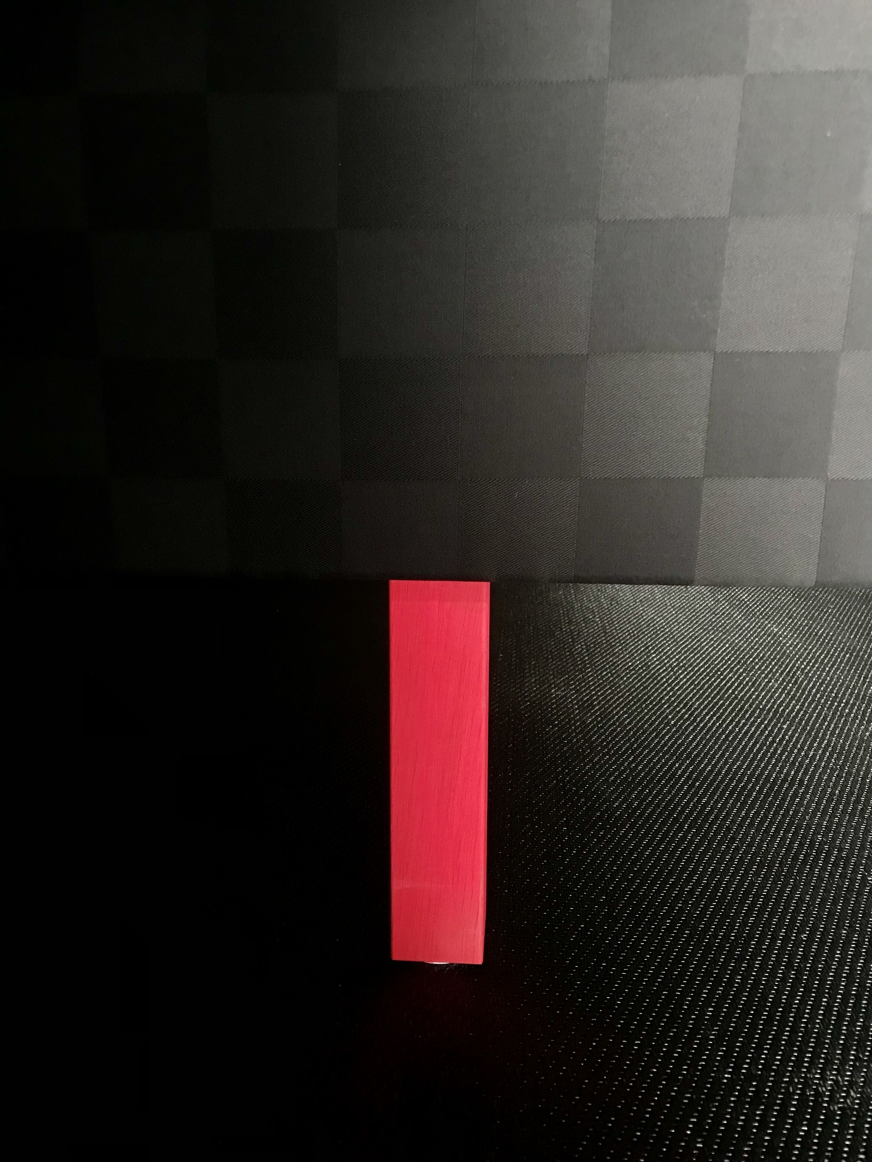 A black and red checkered floor pattern.