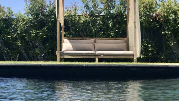 Outdoor pool, pool umbrellas, sun loungers