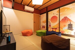 Miyu Reitani | Living area | 30-inch flat-screen TV with cable channels, TV, video-game console