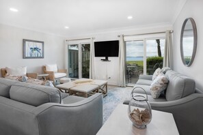 Villa, Multiple Beds, Patio | Living area | 40-inch TV with cable channels