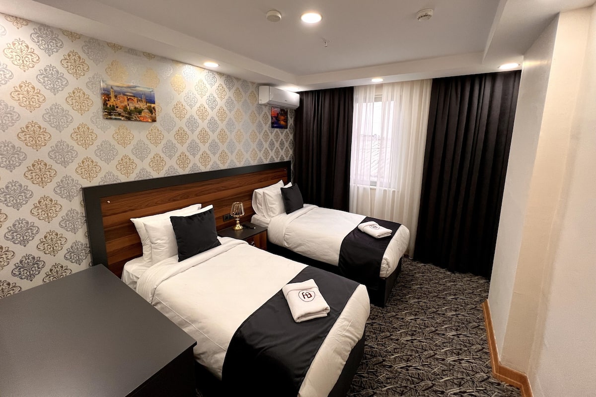 Standard Room | 1 bedroom, premium bedding, minibar, in-room safe