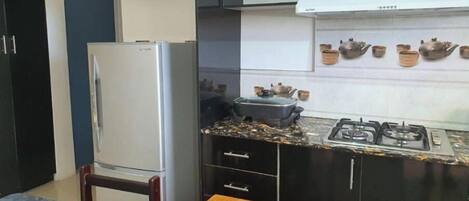 Fridge, microwave, electric kettle, toaster