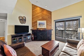 Flat-screen TV, fireplace