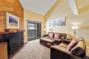 Flat-screen TV, fireplace