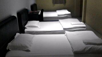 Family Quadruple Room | Desk, iron/ironing board, bed sheets