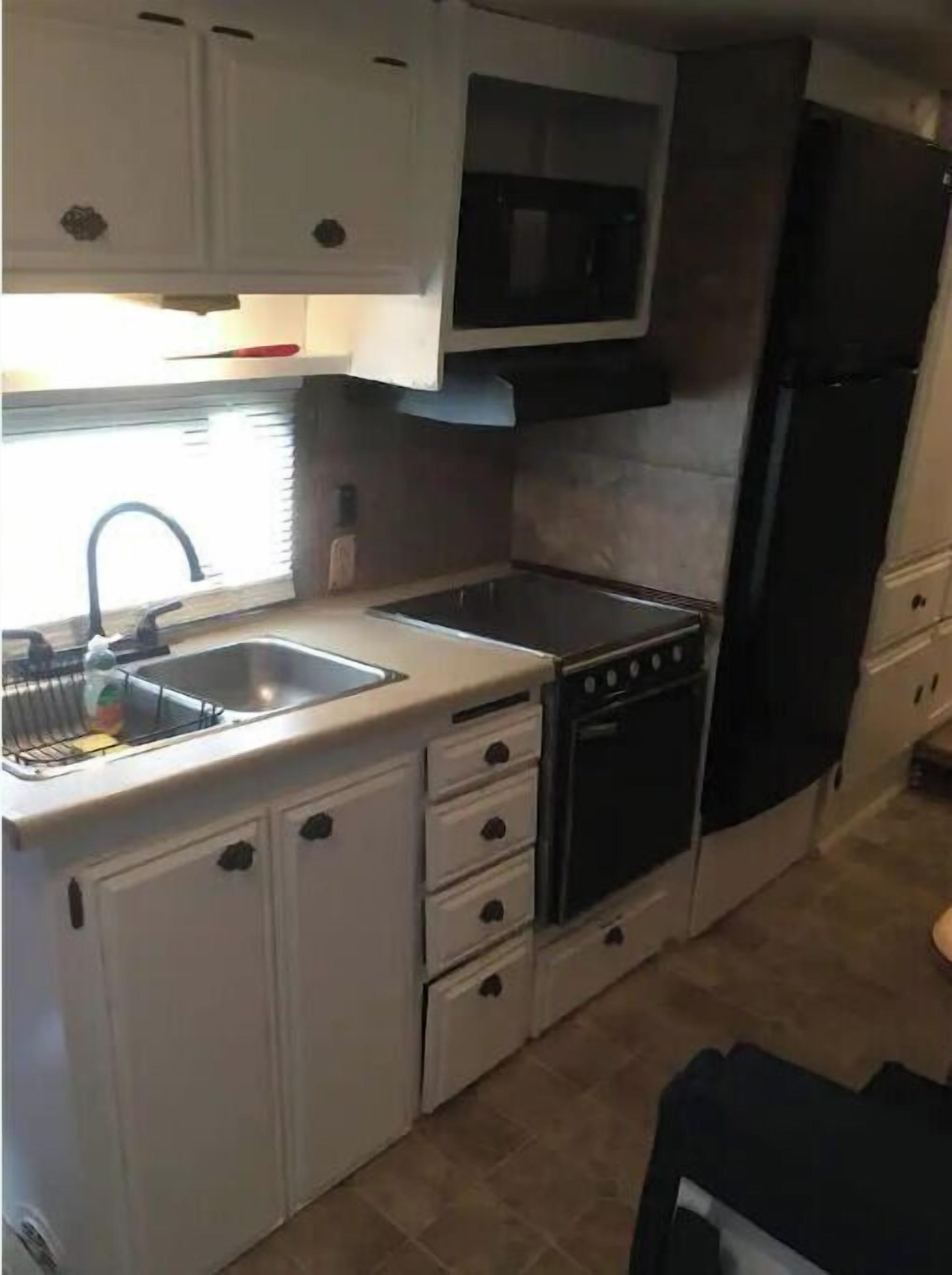 Fridge, microwave, stovetop, cookware/dishes/utensils