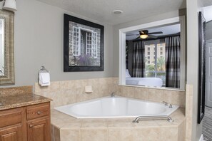 Bathtub, hair dryer, towels, soap