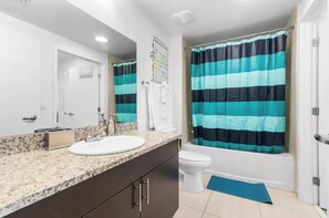 Hair dryer, towels, soap, shampoo