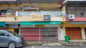 A hotel named Lodge 37T with a sign indicating room rates starting from RM 69.00. - Lodge 37T (Ranau)