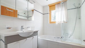 Three-Bedroom Apartment | Bathroom | Designer toiletries, hair dryer, heated floors, towels