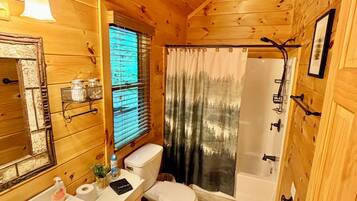 Combined shower/tub, towels, soap, shampoo