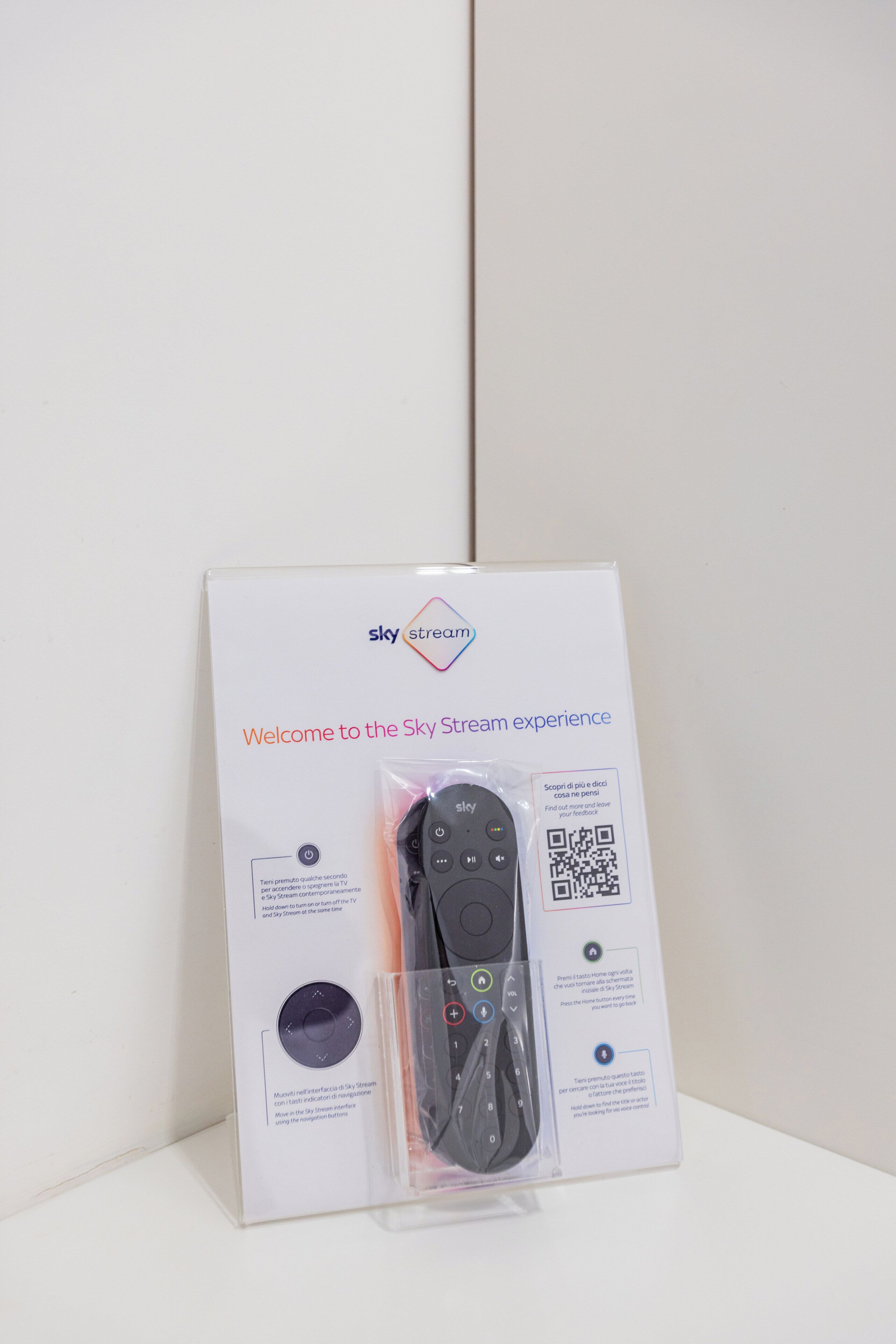 A Sky Stream remote control in its packaging.