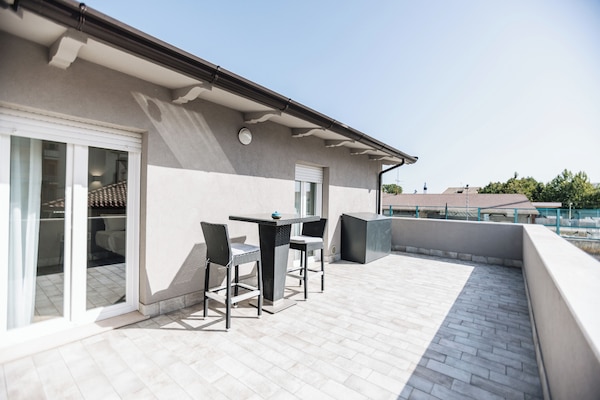 Junior Suite con terrazza | Blick auf die Stadt