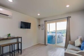 TV - 1 Bed | Private Waterfront Tiny Home w/ Hot Tub! | 1A, Private Waterfront Tiny Home w/ Hot Tub! | 1A (Canyon Lake)