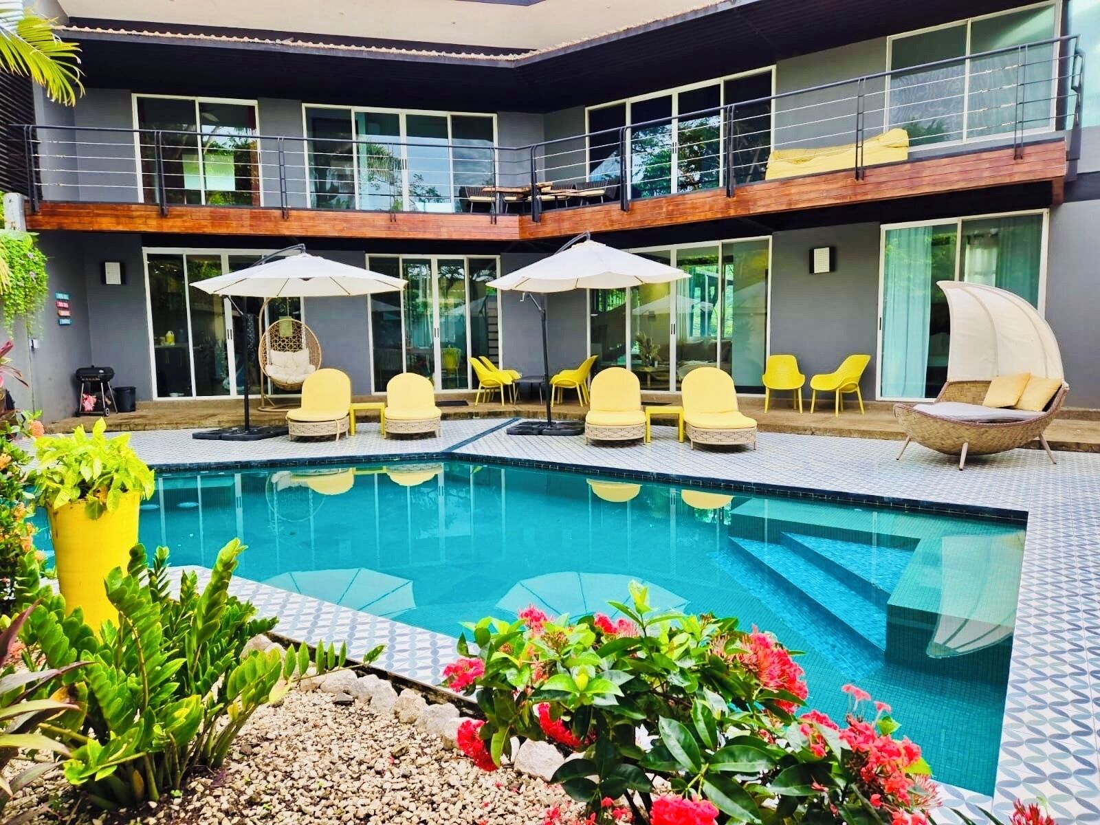 Backyard with pool, cabana, and lots of options for sun or shade.