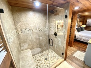 Shower, hair dryer, towels, toilet paper