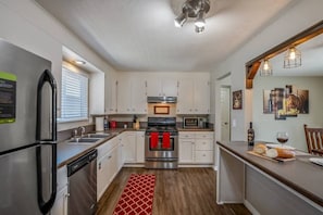 Fridge, microwave, oven, stovetop - The Farmhouse by Host Boise - Pet Friendly Home and Garage near Fairgrounds (Boise)