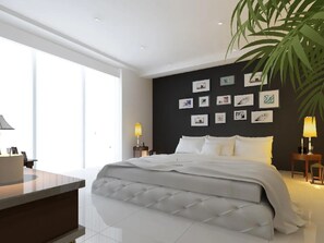 A modern hotel room with a large bed, a desk, and a large window. - Immaculate 3-bed House in Lahore Near Airport (Lahore)