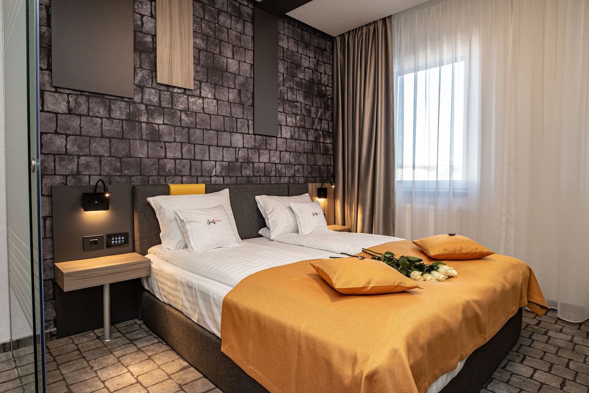 Studio | 1 bedroom, down comforters, in-room safe, blackout drapes