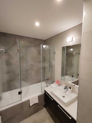 Exclusive Apartment | Bathroom | Shower, hair dryer, bathrobes, slippers