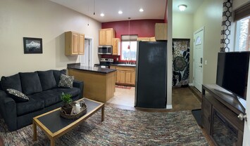 Living room, kitchen and entry