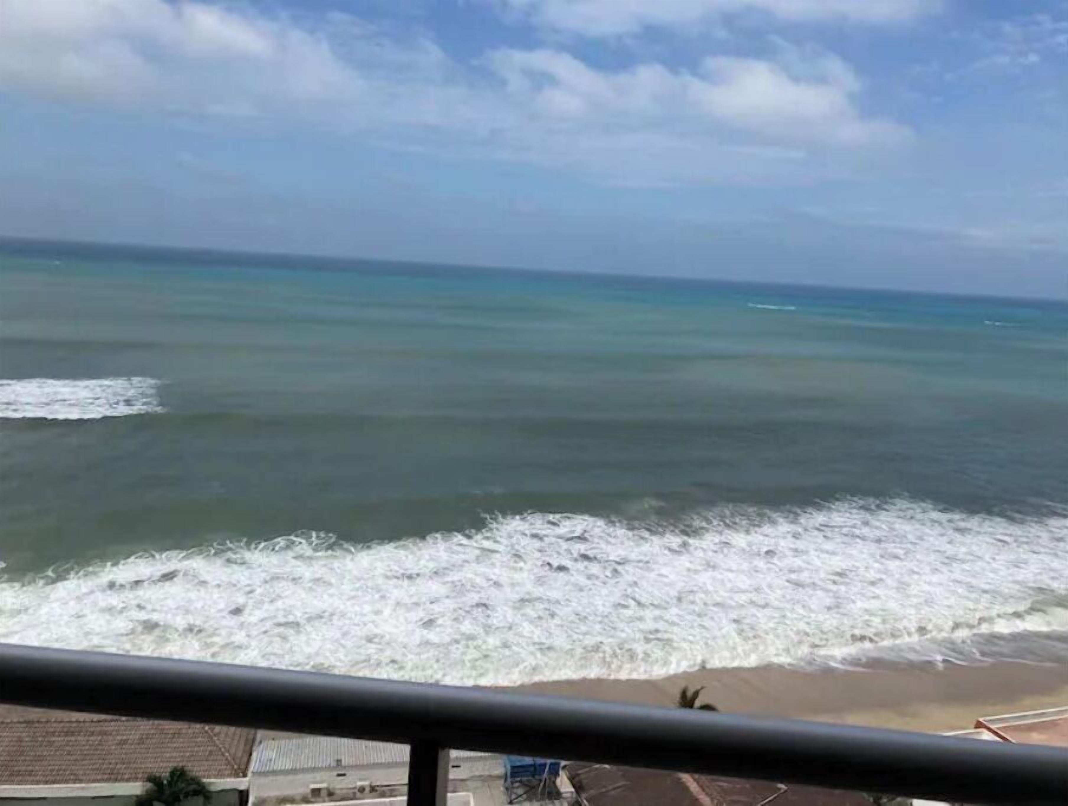 Rannalla, rantapyyhkeitä