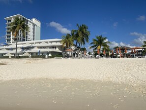 On the beach - Resort style ground floor  condo steps from the beach  (Georgetown)