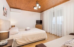 2 quartos, Wi-Fi de cortesia, roupa de cama