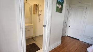 Shower, towels, soap, toilet paper