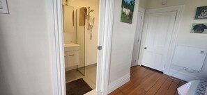 Shower, towels, soap, toilet paper