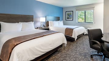 Pillowtop beds, desk, blackout drapes, iron/ironing board